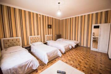 Фото номера Классический трехместный номер Отель Baron Hotel г. Ванадзор 4
